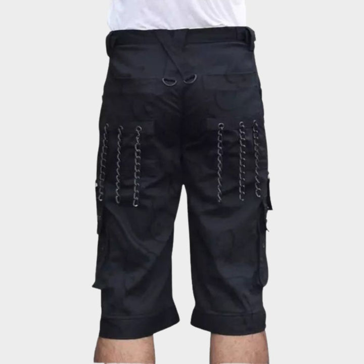 mens gothic black shorts with grey background.
