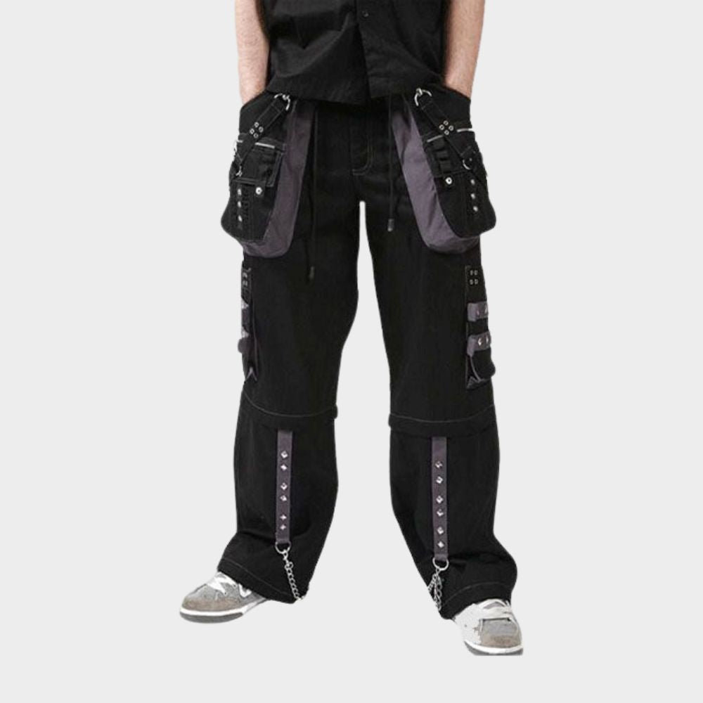 Black emo cargo pants with a close-up view of the studs and metal accessories for an edgy look.