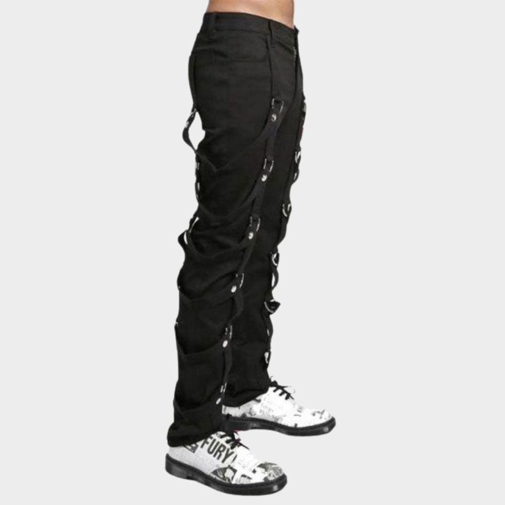 showcasing the comfortable fit and flow of the black gothic tripp pants with statement straps, ideal for a night out or everyday wear.