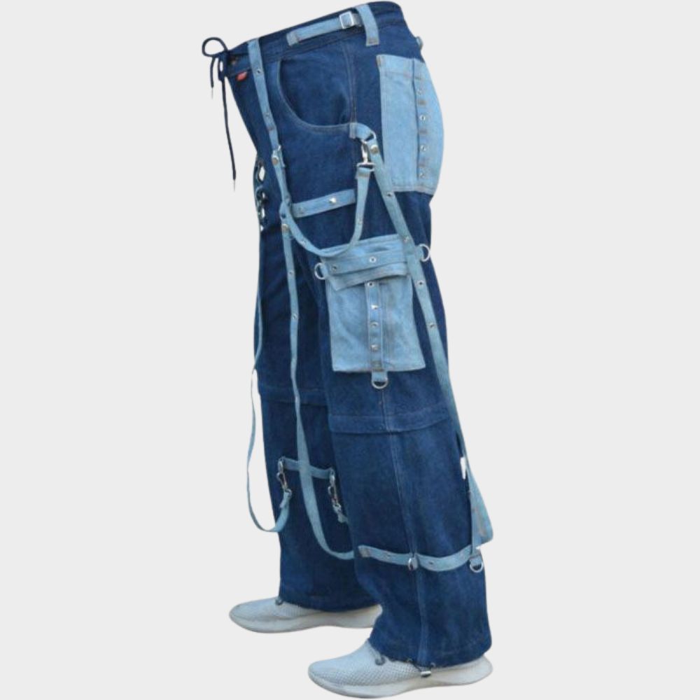 Model walking or jumping in action wearing men's gothic blue convertible cargo pants. The image showcases the comfort and movement of the relaxed fit, ideal for everyday wear with a touch of gothic style. The convertible functionality is implied by the relaxed leg length.