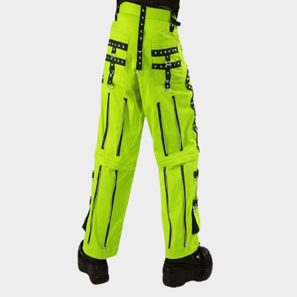 Model confidently striding in eye-catching fluorescent green cargo pants with a relaxed fit, showcasing the gothic electro style with chains and a comfortable baggy silhouette.