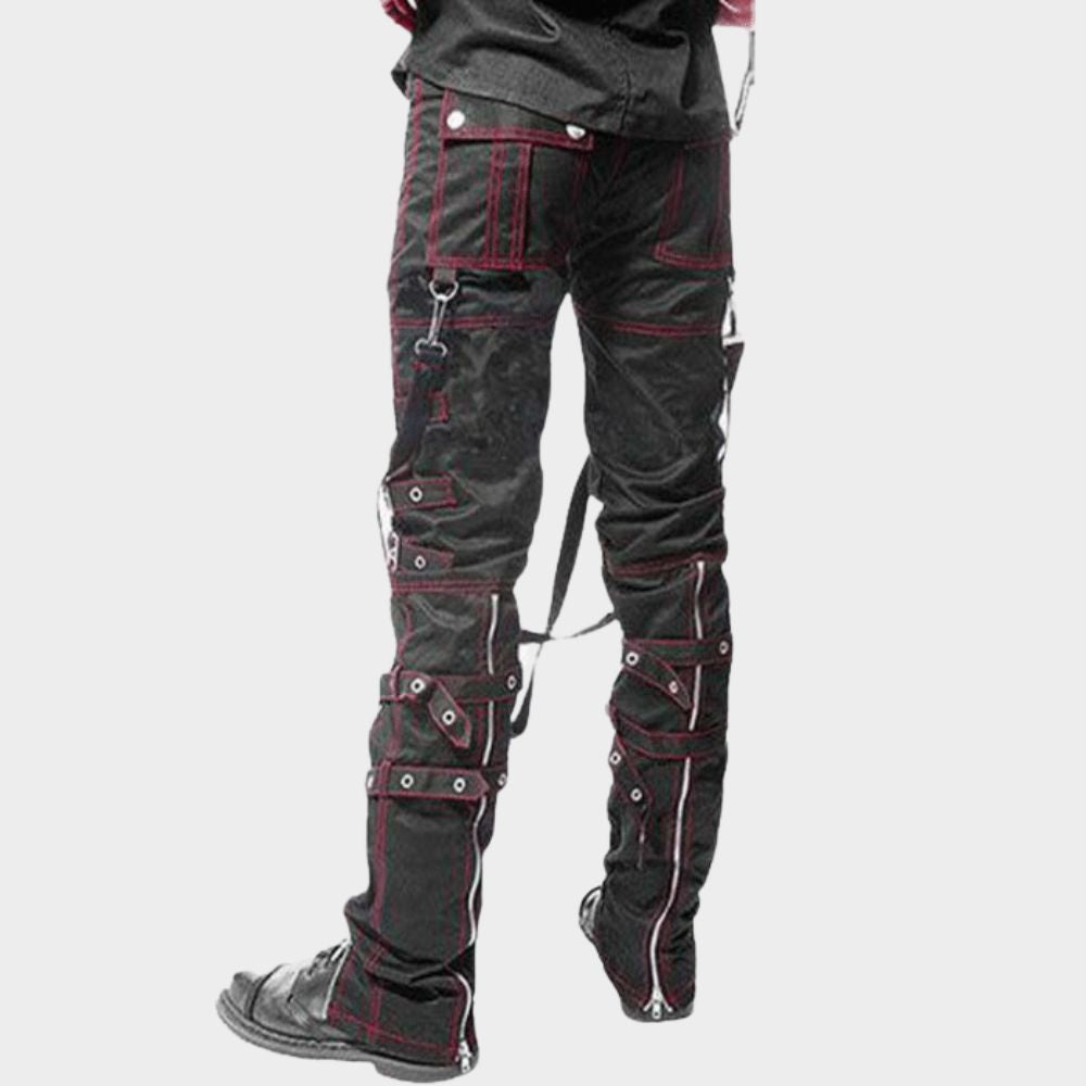Model in action wearing unisex punk rock bondage strap pants. The split-leg design allows for freedom of movement, while the overall edgy details and adjustable legs make these pants ideal for expressing your inner rockstar.