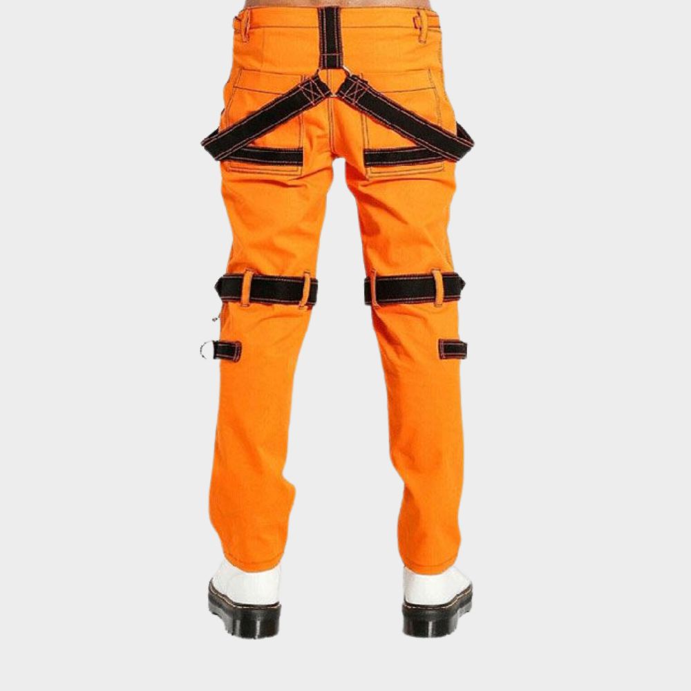 Zoom in on the craftsmanship of men's orange split cargo pants. This close-up reveals the parachute style construction with a canvas waistband, a spacious cargo pocket with a buttoned flap, and a heavy-duty exposed zipper fly.